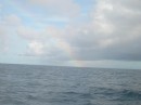 Rainbow over the water en route to Martinique!.JPG