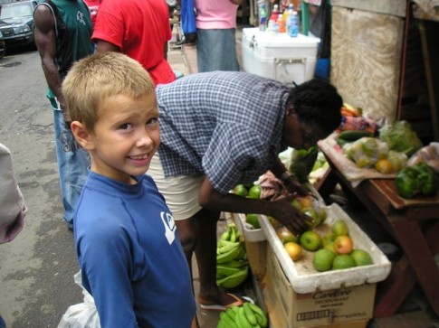 k  John buying some Ceylon Mangoes- a bag of 6 for 5 EC( $2 us).JPG