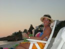 Val enjoying a Sundowner at Sapodilla Beach in the Turks and Caicos