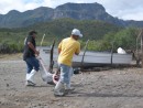 San Evaristo - Fishermen bring a shark up onto land. This image killed our desire to go any snorkling that day. 