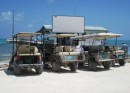 Cay Caulker - Golf carts (ie taxis) lining up to greet people as they get off the ferry from Belize City. 