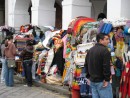 Local artisans selling their garb in Cuenca. Wool or llama scarfs and sweaters are popular. 