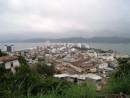 Bahia de Caraquez - View of the town of Bahia which sits on a peninsula. Half of the high rise buildings are unoccupied and in disrepair from a major earthquake that hit in 1989. The high rises that were repaired are 2nd homes for wealthy families from Quito and other larger cities.
