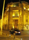 The Bank building in Quito at night. 