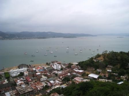 Bahia de Caraquez - This is a view of the anchorage from atop a giant cross that is erected on the hillside overlooking the town of Bahia. Typical marine layer weather on the day we hiked up the hillside. 