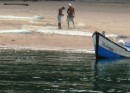 Las Perlas Islands - fishermen working on their nets. 