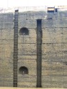 Canal Transit – Wall of the lock, pretty rough and can do damage to a little sailboat. We were happy to be center tied. 