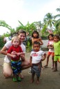 San Blas (Isla Pinos) – Lara and Cobin with a few of the local Kuna kids. They all loved seeing themselves on the camera after the picture was taken. 