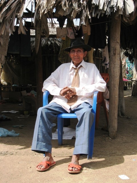San Blas (Isla Pinos) – The Sailas or chief of the Isla Pinos village wanted his picture taken and printed off to keep in his hut. Here he poses in his nicest shirt, tie and pants in front of his home. When we first arrived we were taken to the Sailas to ask approval to walk around the village and visit with the locals, it was our second day when we asked approval to hike to the top of the island that he asked for this picture to be taken. Typically it isn’t polite to take pictures of the Kuna Indians unless solicited to do so; and they usually ask $1 per picture. While their traditional dress (especially the women who wear bright clothes and beads on their arms and legs) and lifestyle are very interesting we didn’t quite feel comfortable taking photos so that is why you don’t see any on our blog. 