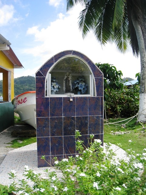 Isla Grande – Little Jesus shrines are in every neighborhood in central and south America, just like Starbucks in the US. Sort of tacky way to describe them but couldnt be more true!
