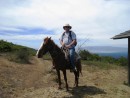 Kent on his trusty horse for the ride up to a volcano rim on Isabela Island. 