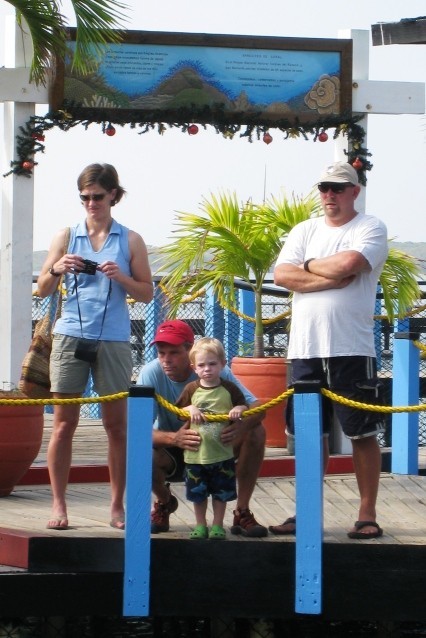 Rosario Islands, Columbia – Lara, Joe with Cobin and Kent watch the shark show at the Aquarium. It was all in Spanish so only a little of what was said was understood. 
