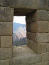 Machu Pichu - view of the surrounding mountains through a window.
