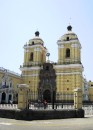 San Francisco church in Lima. The black dots on the yellow exterior are black birds. They were everywhere, you had to duck for cover upon entering and exiting. 