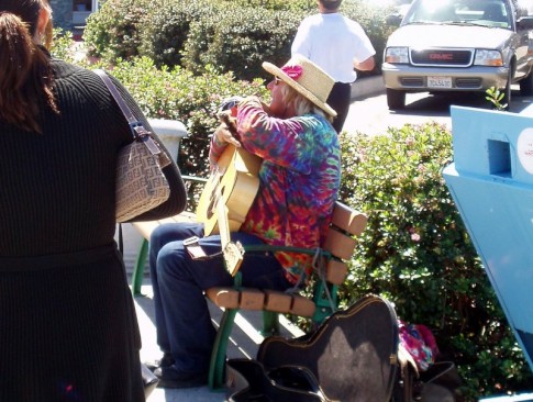 A colourful gentleman who plays and sings everyday at the Sausalito ferry wharf.