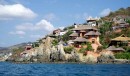 Like most mexican waterfront towns, Ztown has been discovered.  The shore of La Ropa beach is the site of very high end condos a