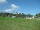 Niue: A typical village, centered around a large central grassy area.