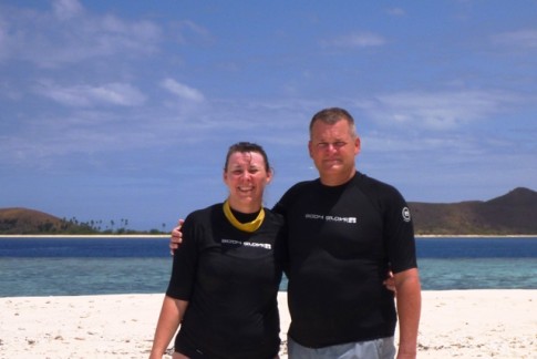 Pam and Mark on "Sandpile Island," one of our favorite day spots with a fabulous little reef.