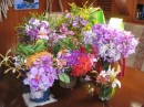 Seven bunches of flowers! Check out the  orchids! The little bunch on the right was the last, delivered by a lone little boy in a canoe.