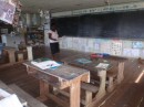 The principal/teacher in one of the primary school classrooms