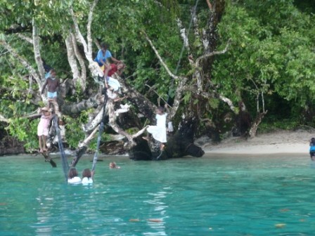 Kids were always climbing, swinging, jumping off this tree near where we were anchored