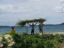 Enoch and crew (his daughter is on the left) build a sun shelter on Bird Island