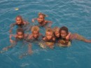 Kids swim out to visit Asylum in Port Mary. 