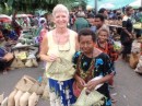 Katie treats herself to a small basket at the Rabaul market