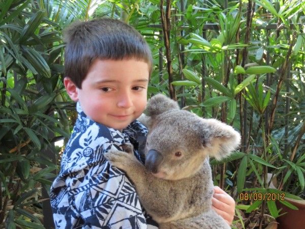 Jake holds Elvis the koala