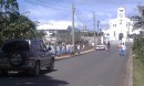 School children walking down the street in their school uniforms