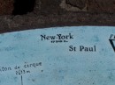 A sign at the volcano indicating the distance to New York
