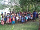 The children from the school singing for us