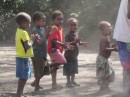 These little boys were standing on the side singing and dancing along with the villagers who were performing the ceremony