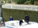 The weather was getting chilly.  The boat is at the bottom of a lock.