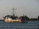 It is the end of lobster season and this boat is unloading its lobster traps in the Hobbies.
