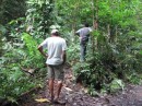 Maury & Leslie, our guide, looking for birds in the rainforest.
