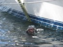 Diver checks placement of straps