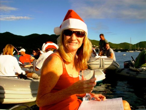 Mary sing Christmas carols in the St Maarten dinghy raft-up