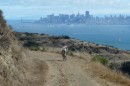 Beth rides up the Fire Road Trail that winds around the upper reahes of the island forming a complete scenic loop!