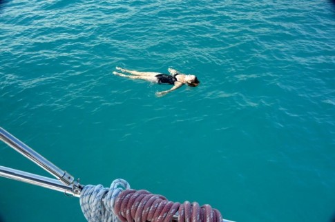 Beth enjoys a float in the clear, blue sea.  The water temp was 82 F.