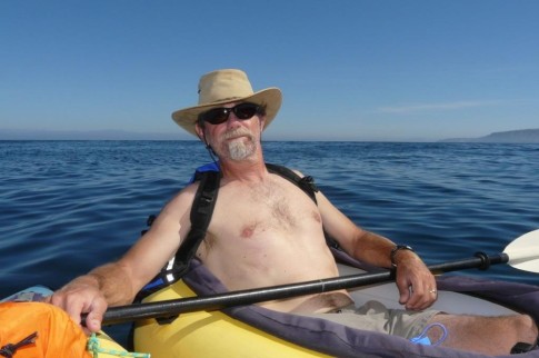 Norm catches some rays as we kayak along the shore.