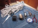 The pause gave us time for some boating chores like this marlinspike project.  We gathered a few spare parts, some cordage and a few tools . . . 