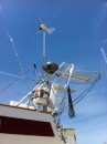 The davit pulley system is reinstalled as well as the repaired stern-rail grill.