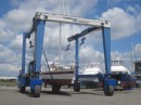 The travel lift moves Earendil to her new berth on land