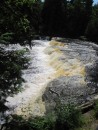 Lower falls, Tahquemon River. The yellow tint is from tannins in the water from the cedar/hemlock swamps.