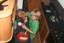 Zach making a snack in the galley