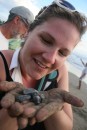 Krista holds her own Olive Ridley turtle to be released into the wild.