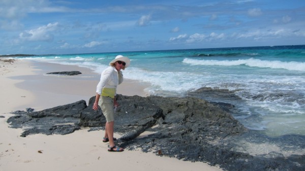 Susan looking for sea glass on the Great Guana Beach