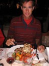 IMG_0363: John enjoys lobster dinner