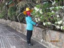 Thai lady gardener dressed to work